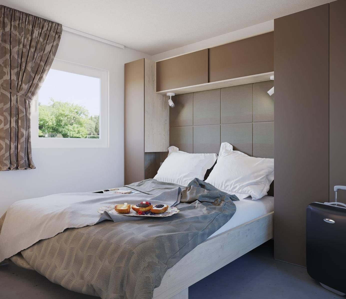 Schlafzimmer mit Doppelbett im Vertix